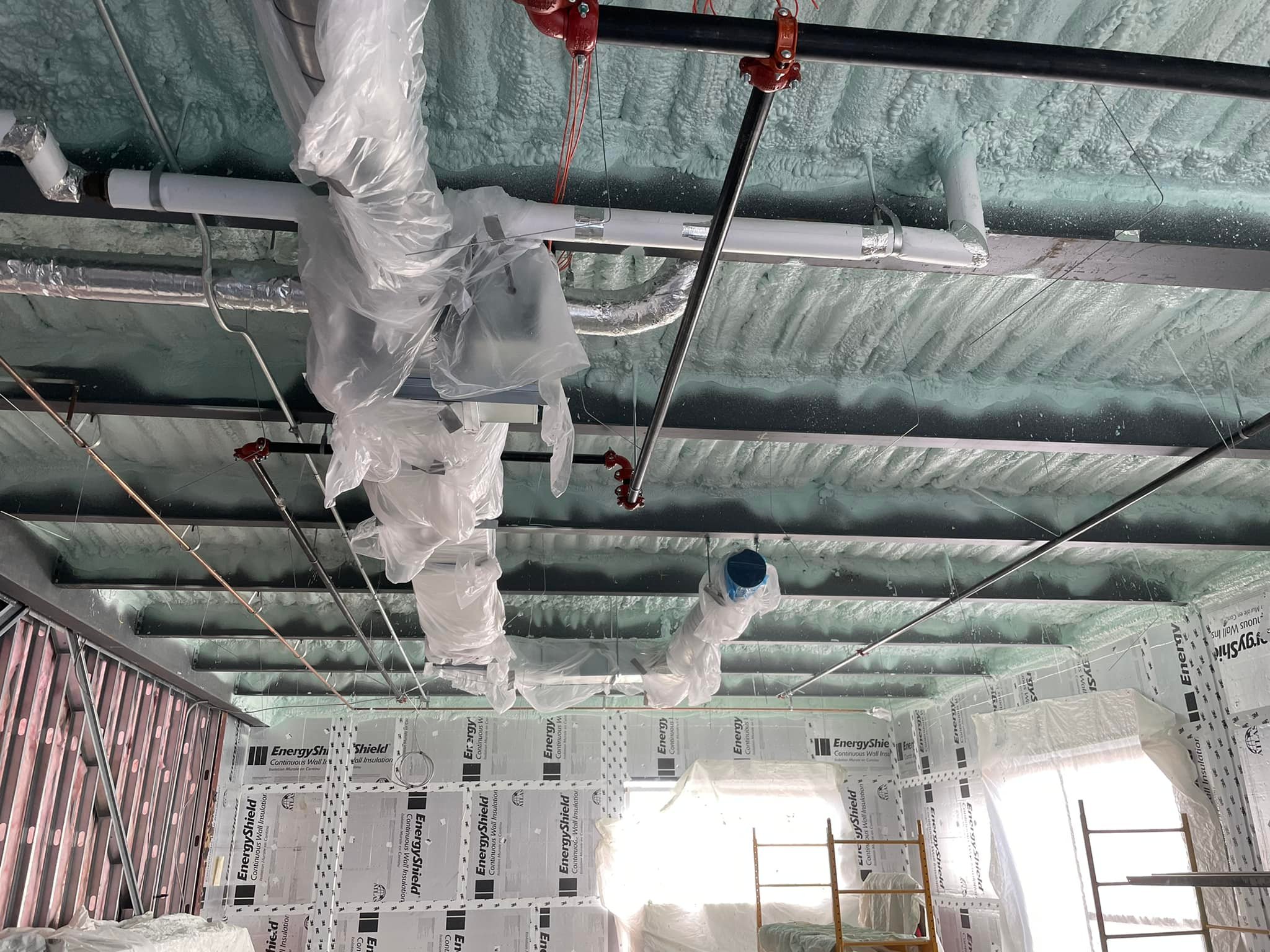 Isolation extérieure avec panneaux isolants rigides sur une maison  à Alma