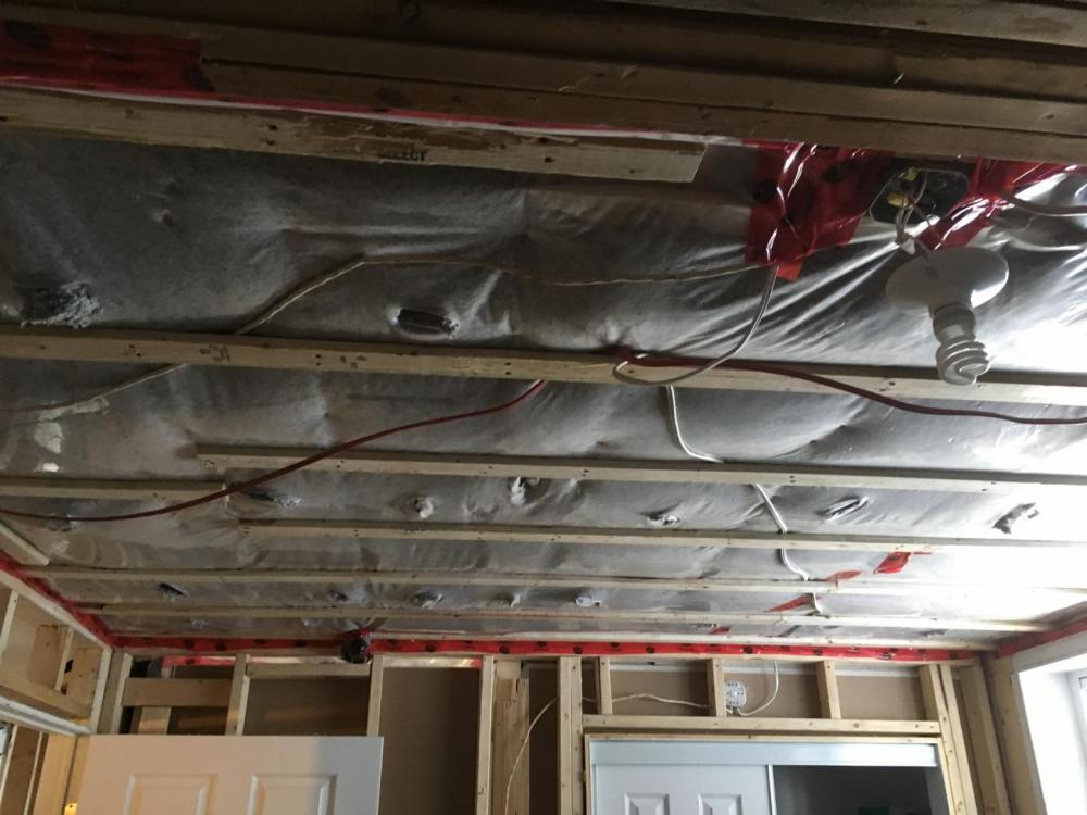 Isolation extérieure avec panneaux isolants rigides sur une maison  à La tuque