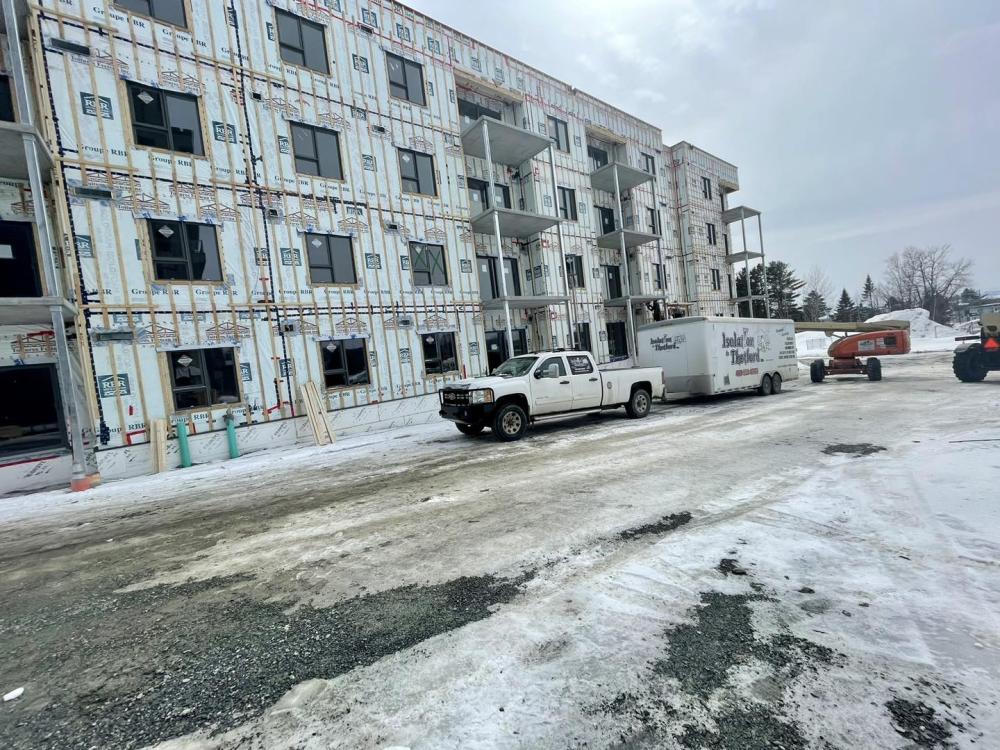 Isolation extérieure avec panneaux isolants rigides sur une maison en Beauce